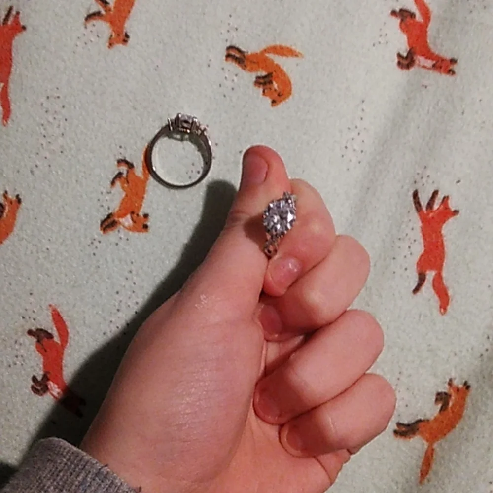 2 cubic zirconia rings both included